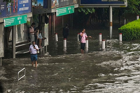 Delhi Weather: A waterlogged bus stop